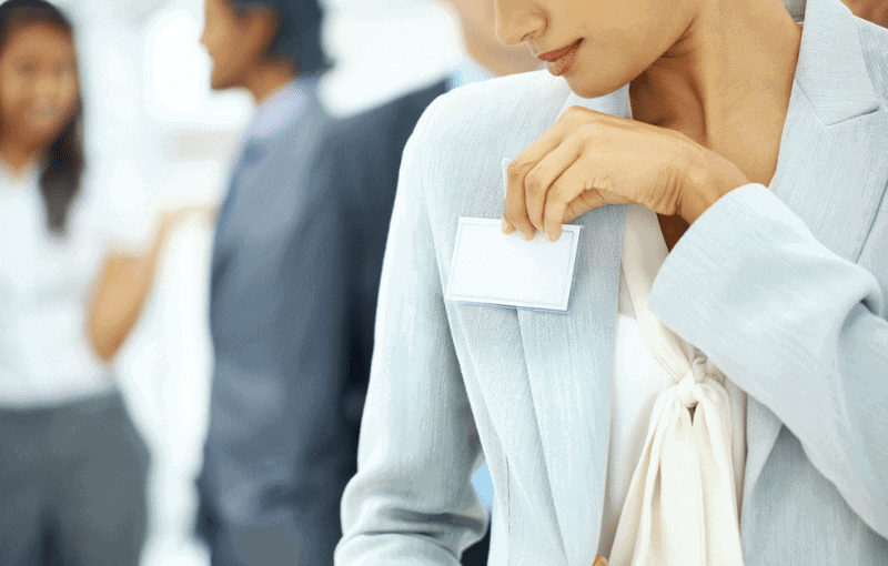 Woman in smart pale blue jacket and cream blouse Woman in smart pale blue jacket and cream blouse